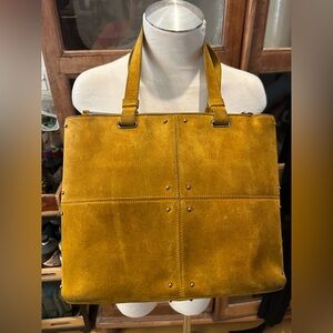 TOD’S Quilted Classic Leather Silver-Studded Bucket Bag in Mustard